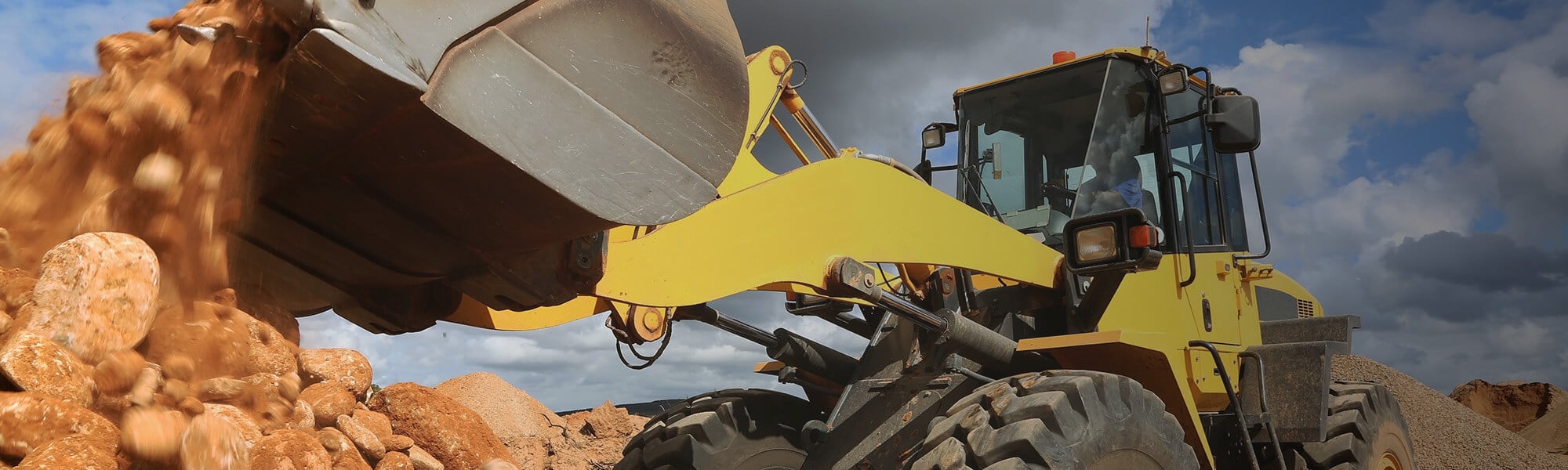 Loader Moving Rock