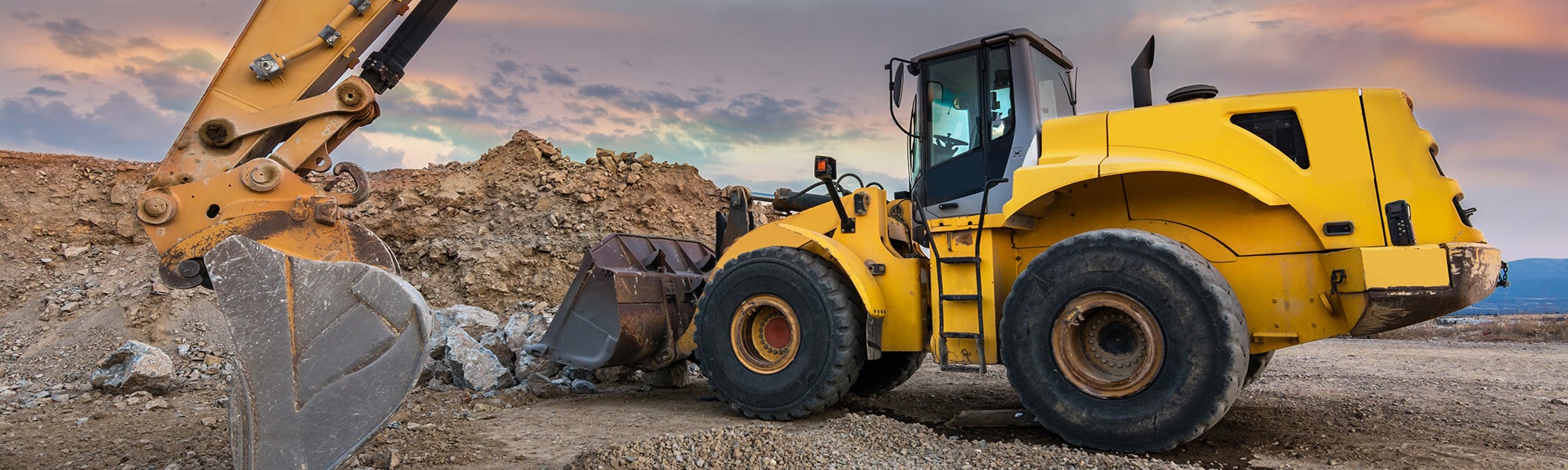 Loader and Excavator Moving Dirt